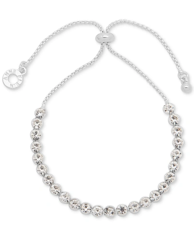Shop Anne Klein Silver-tone Round-stone Bolo Bracelet In Crystal