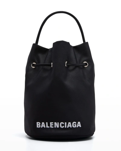 Shop Balenciaga Wheel Logo Drawstring Bucket Bag In Black/ L White