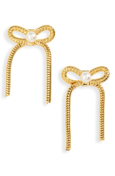 Shop Lele Sadoughi Imitation Pearl Bow Stud Earrings In Gold