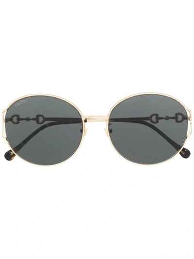 Shop Gucci Round Tinted Sunglasses In Gold
