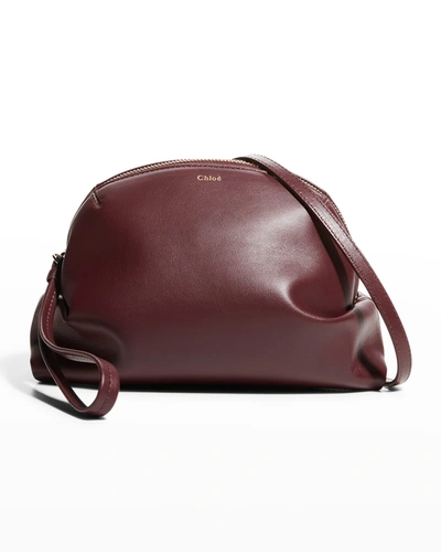 Shop Chloé Judy Mini Slouchy Leather Crossbody Bag In Burgundy