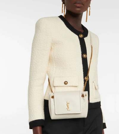 Shop Saint Laurent Nolita Mini Leather Shoulder Bag In Crema Soft