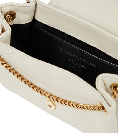Shop Saint Laurent Nolita Mini Leather Shoulder Bag In Crema Soft