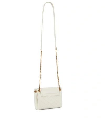 Shop Saint Laurent Nolita Mini Leather Shoulder Bag In Crema Soft