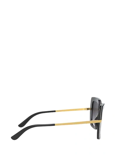 Shop Dolce & Gabbana Eyewear Sunglasses In Top Black On Print Leo / Black