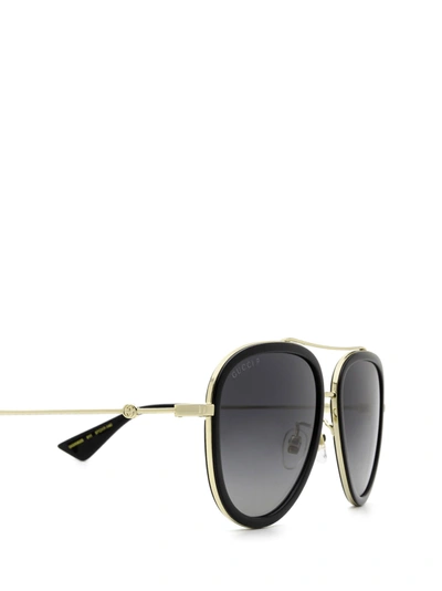 Shop Gucci Eyewear Sunglasses In Gold