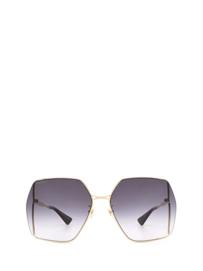 Shop Gucci Eyewear Sunglasses In Gold
