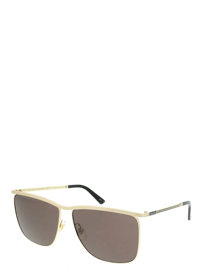 Shop Gucci Eyewear Sunglasses In Gold