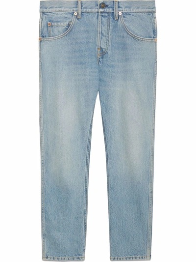 Shop Gucci Bleach-effect Tapered-leg Denim Jeans In Blue