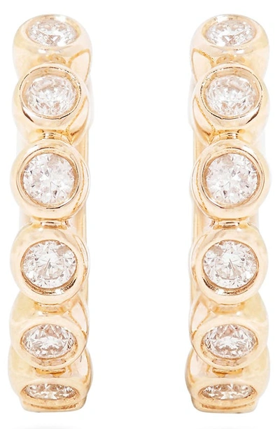 Shop Stone And Strand Bezel Diamond Huggie Hoop Earrings In 10k Yellow Gold White Diamond