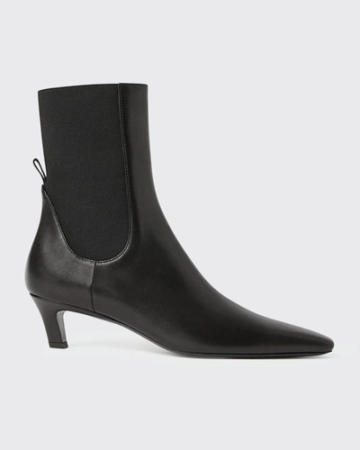 Shop Totême The Mid Heel Calfskin Ankle Boots In Black 200