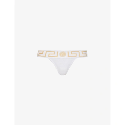 Shop Versace Greca-border Mid-rise Stretch-cotton Jersey Thong In A1001 Optical White