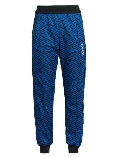 Shop Versace Geometric Monogram Print Sweatpants In Blue Navy Print