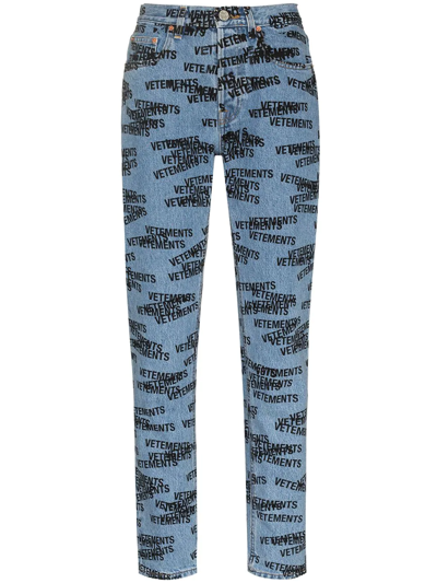 Shop Vetements Logo Print Straight-leg Jeans In Blue