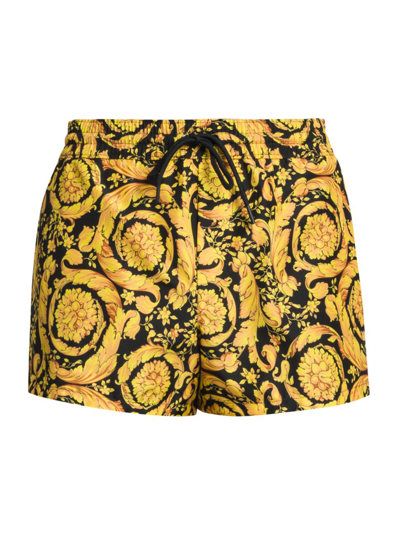 Shop Versace Men's Nylon Swim Shorts In Gold Print