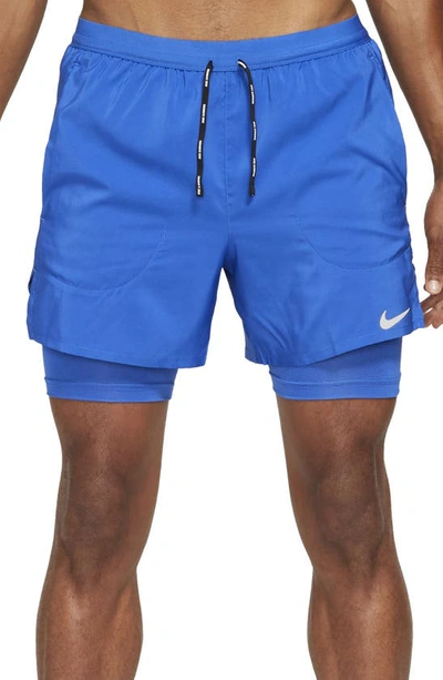 Shop Nike Dri-fit Flex Stride Pocket 2-in-1 Running Shorts In Game Royal/ Game Royal