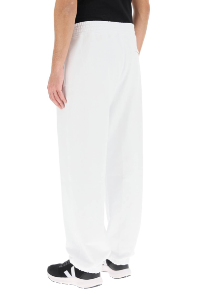 Shop Neil Barrett Bolt Logo Baggy Sweatpants In White