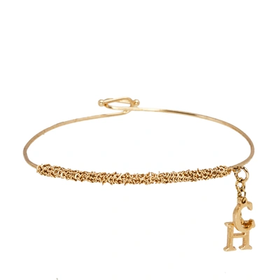 Pre-owned Ch Carolina Herrera Logo Charm Gold Tone Bracelet