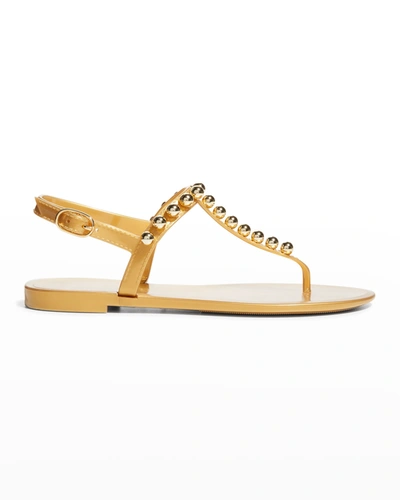 Shop Stuart Weitzman Goldie Jelly Stud Thong Sandals In Gold Tonal