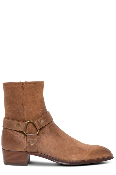 Shop Saint Laurent Wyatt Harness Detailed Ankle Boots In Brown