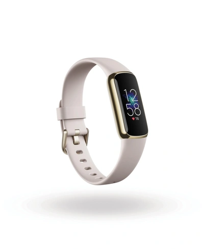 Shop Fitbit Luxe Fitness Tracker In Soft Gold With Lunar White Wrist Band In Soft Gold And Lunar White