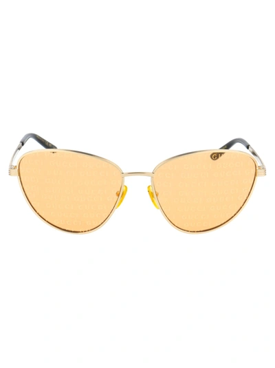Shop Gucci Women's  Gold Metal Sunglasses