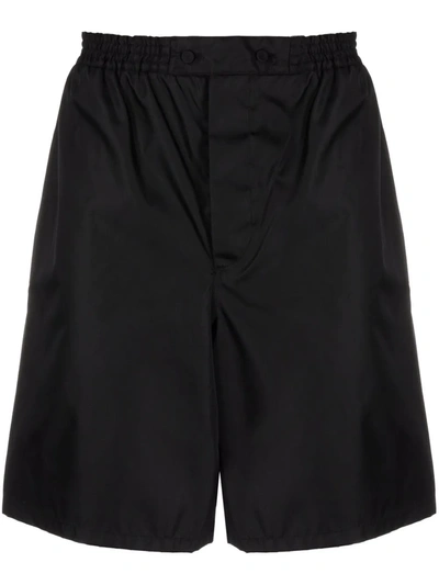Shop Prada Re-nylon Elasticated Waist Bermuda Shorts In Schwarz