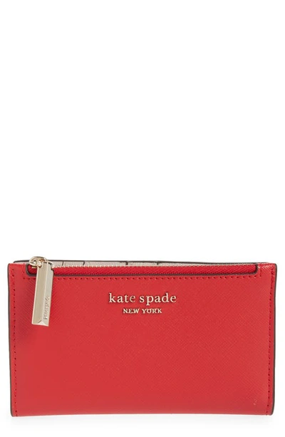 Shop Kate Spade Small Spencer Slim Leather Bifold Wallet In Lingonberry