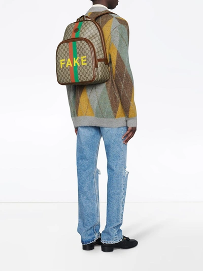 Shop Gucci Printed Backpack In Beige