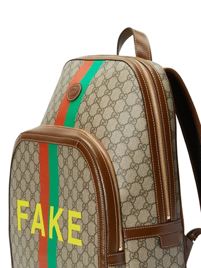 Shop Gucci Printed Backpack In Beige