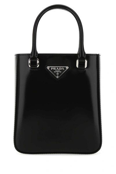 Shop Prada Logo Plaque Small Tote Bag In Black