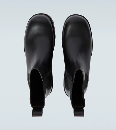 Shop Bottega Veneta Strut Leather Chelsea Boots In Black