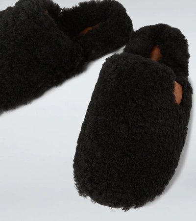 Shop Loewe Shearling Slippers In Black