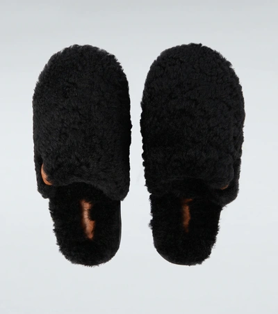 Shop Loewe Shearling Slippers In Black