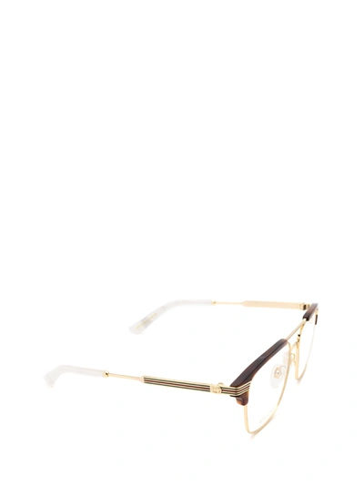 Shop Gucci Eyewear Eyeglasses In Gold