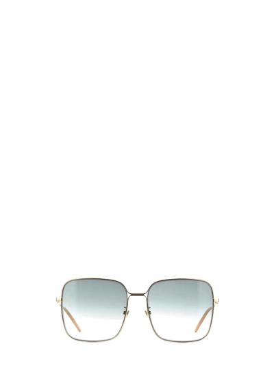 Shop Gucci Eyewear Sunglasses In Gold