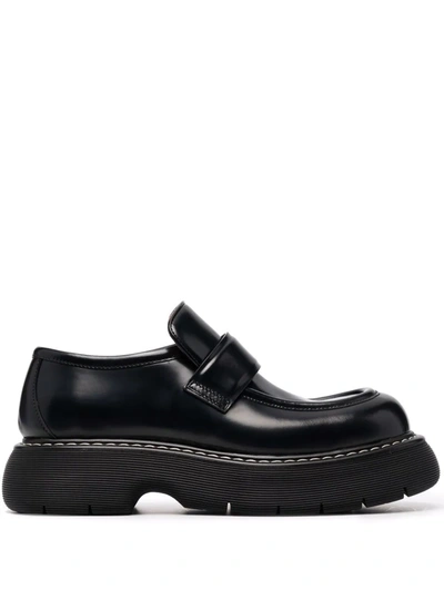 Shop Bottega Veneta Bounce Calfskin Loafers In Black
