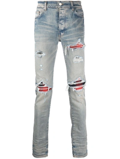 Shop Amiri Ripped-detail Denim Jeans In Blue