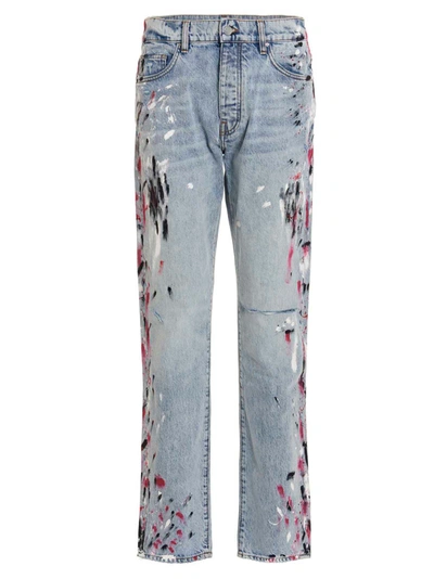 Shop Amiri Paint Splatter Jeans In Blue