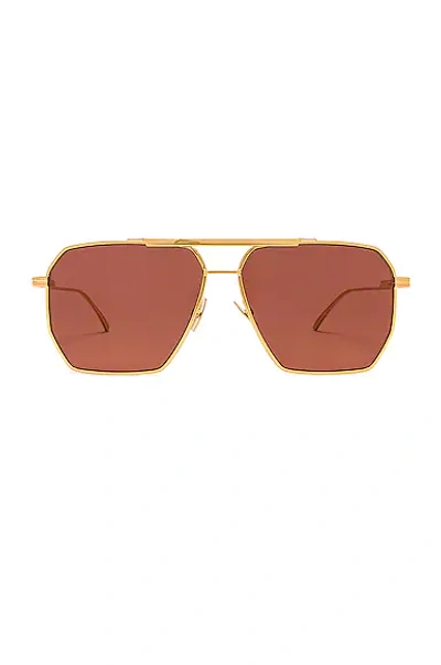 Shop Bottega Veneta Light Ribbon Pilot Sunglasses In Gold
