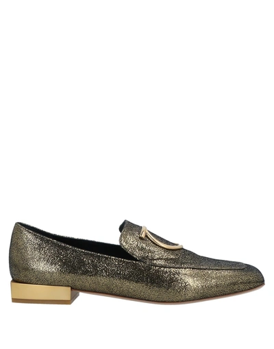 Shop Ferragamo Loafers In Gold