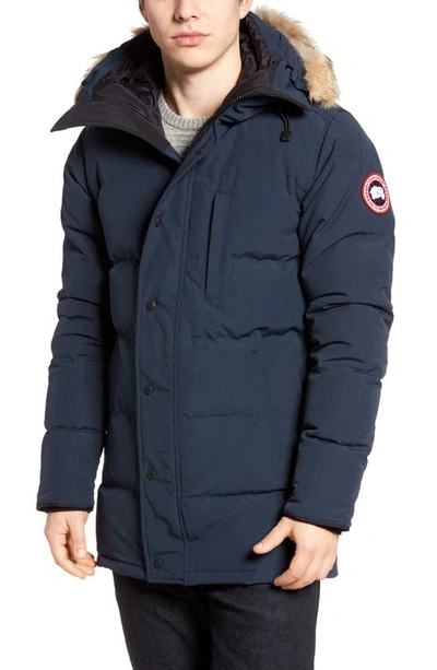 Shop Canada Goose 'carson' Slim Fit Hooded Parka With Genuine Coyote Fur Trim In Ink Blue