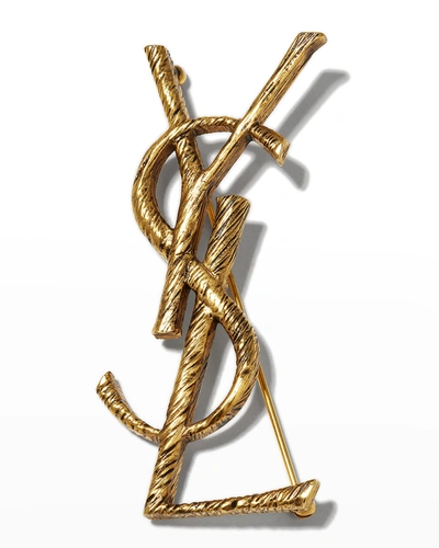 Shop Saint Laurent Ysl Monogram Brooch In Old Gold