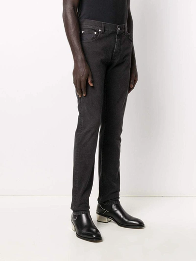 Shop Alexander Mcqueen Trousers In Black Washed
