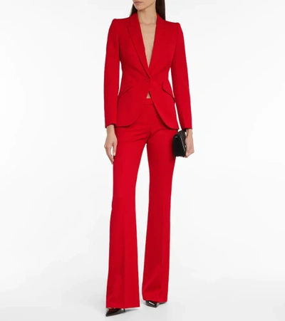 Shop Alexander Mcqueen Virgin Wool Bootcut Pants In Lust Red