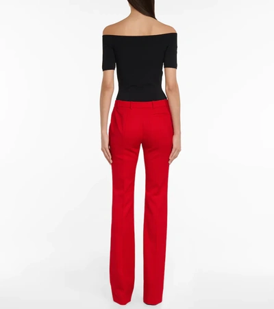 Shop Alexander Mcqueen Virgin Wool Bootcut Pants In Lust Red