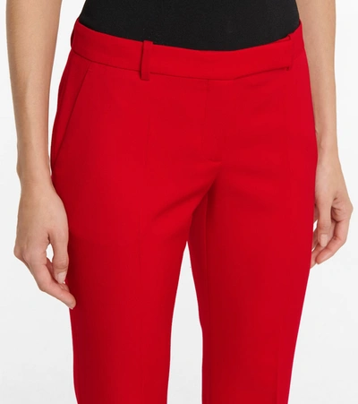 Shop Alexander Mcqueen Virgin Wool Bootcut Pants In Lust Red