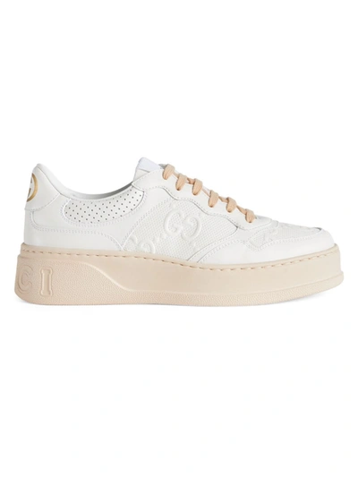 Shop Gucci Women's Gg Embossed Leather Sneakers In White