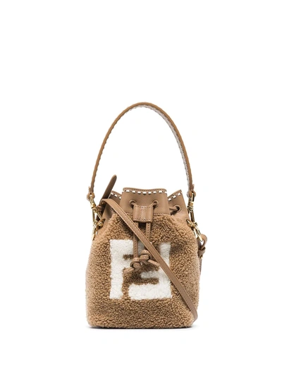 FENDI: Mon Tresor bucket bag in sheepskin with FF logo - Beige