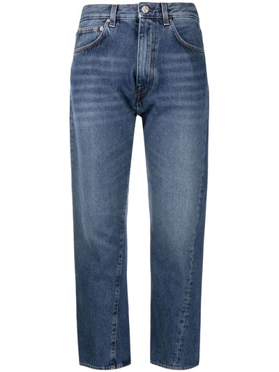 Shop Totême Twisted Seam Cropped Jeans In Blau